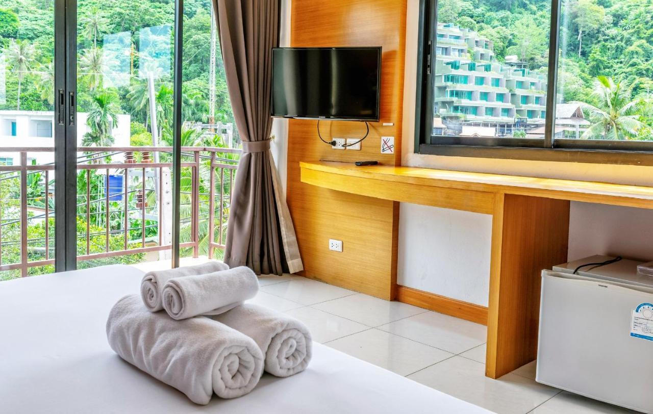 Corsica Guesthouse Pantai Kata Bagian luar foto